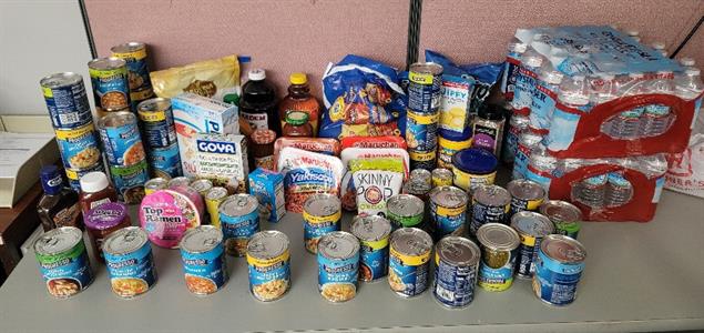 A table full of donated food items