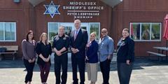 The DOC MAT team stands with representatives from the Middlesex County Sheriff's Office