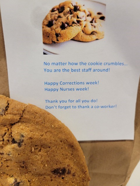 A bag of cookies with a thank-you message to staff