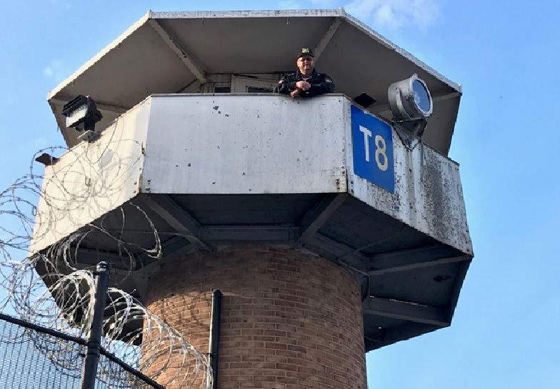 Corrections Officer 1 Mike Long watches from the tower