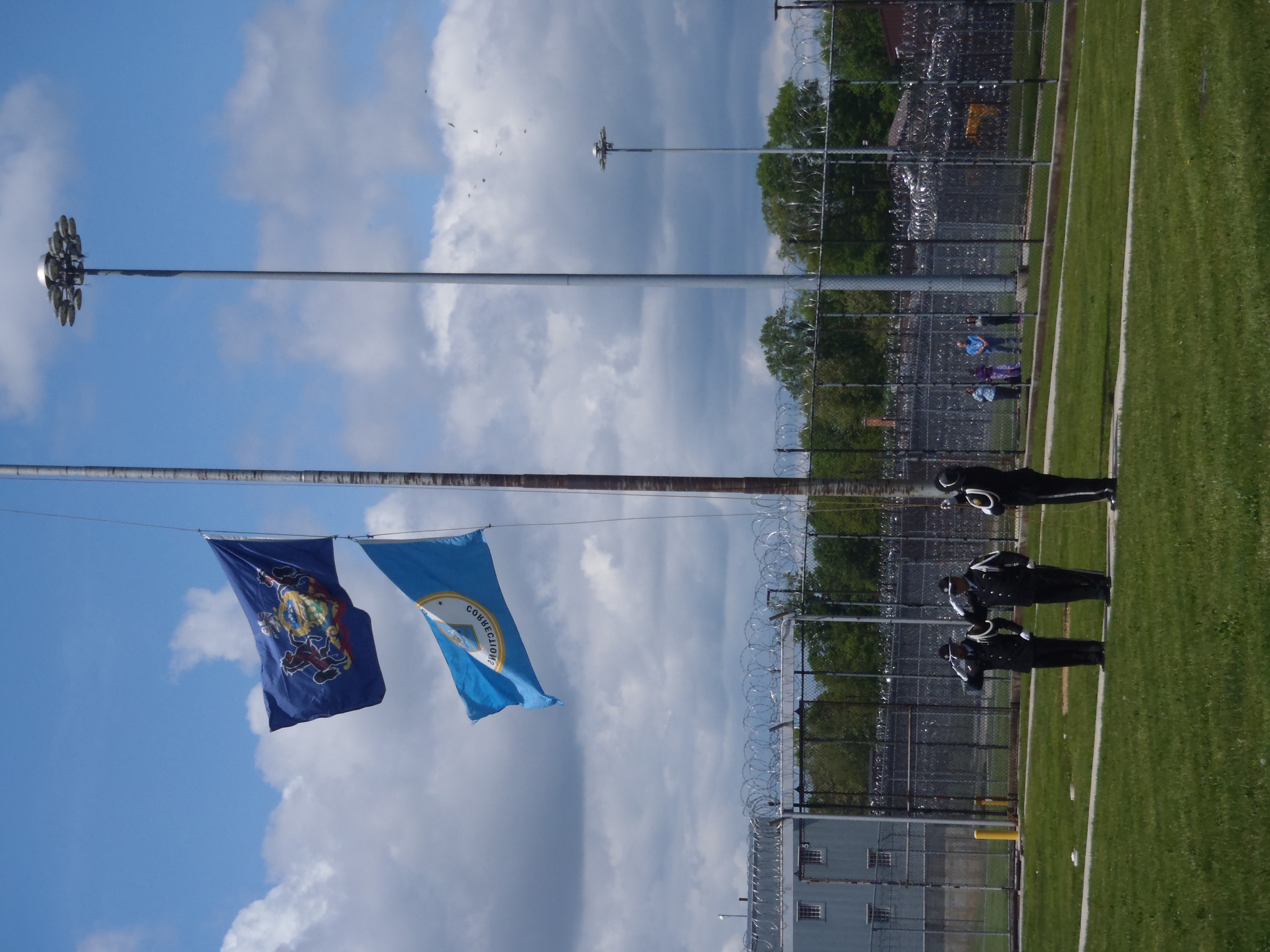 The SCI Camp Hill Honor Guard raises the colors