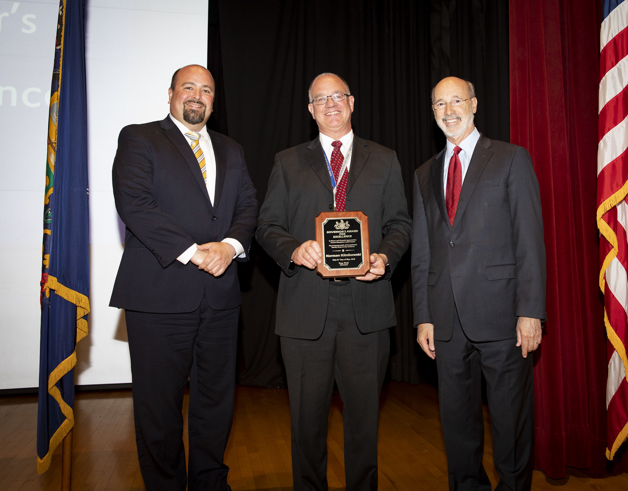 Norm Klinikowski receives an award from Governor Wolf