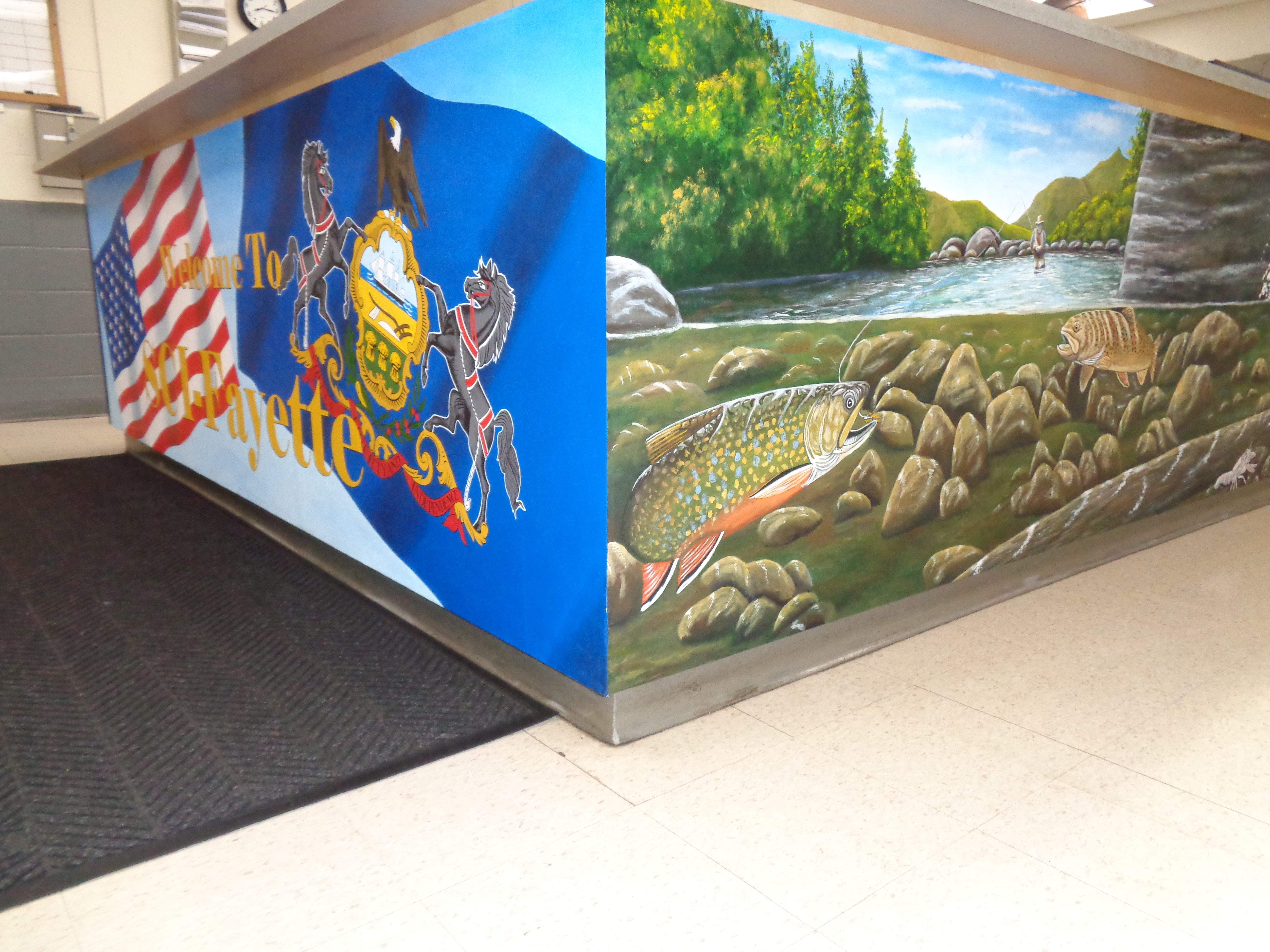 Murals showing a forest river scene and the US and Pennsylvania flags