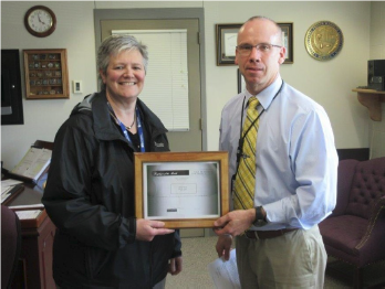 Parole Agent Amy Powers is awarded Employee of the Month