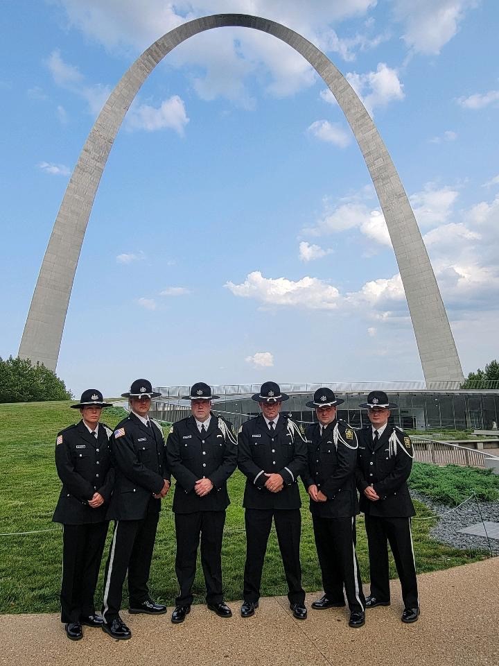 SCI Huntingdon Honor Guard stand in front of The Gateway Arch.