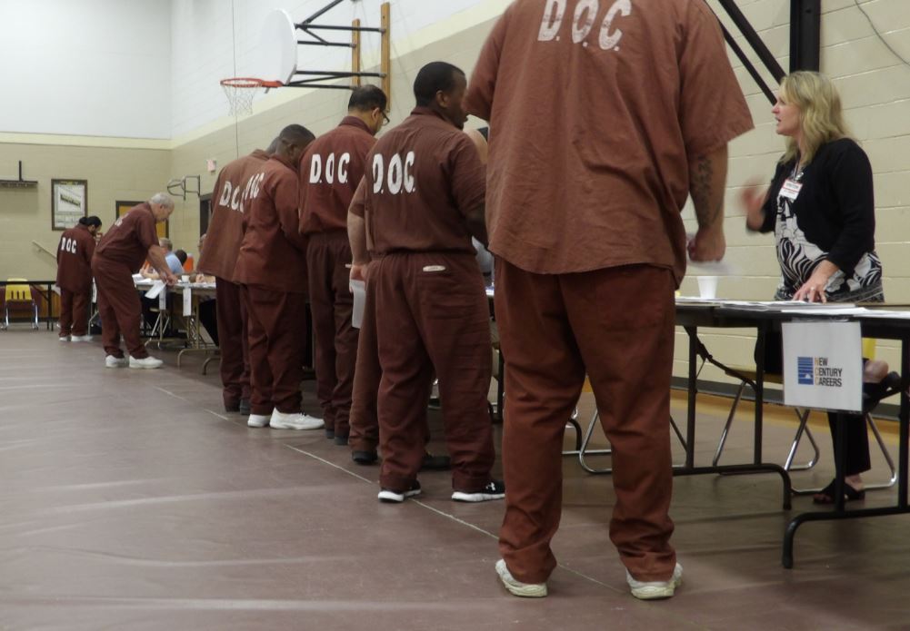 Inmates attend a reentry fair