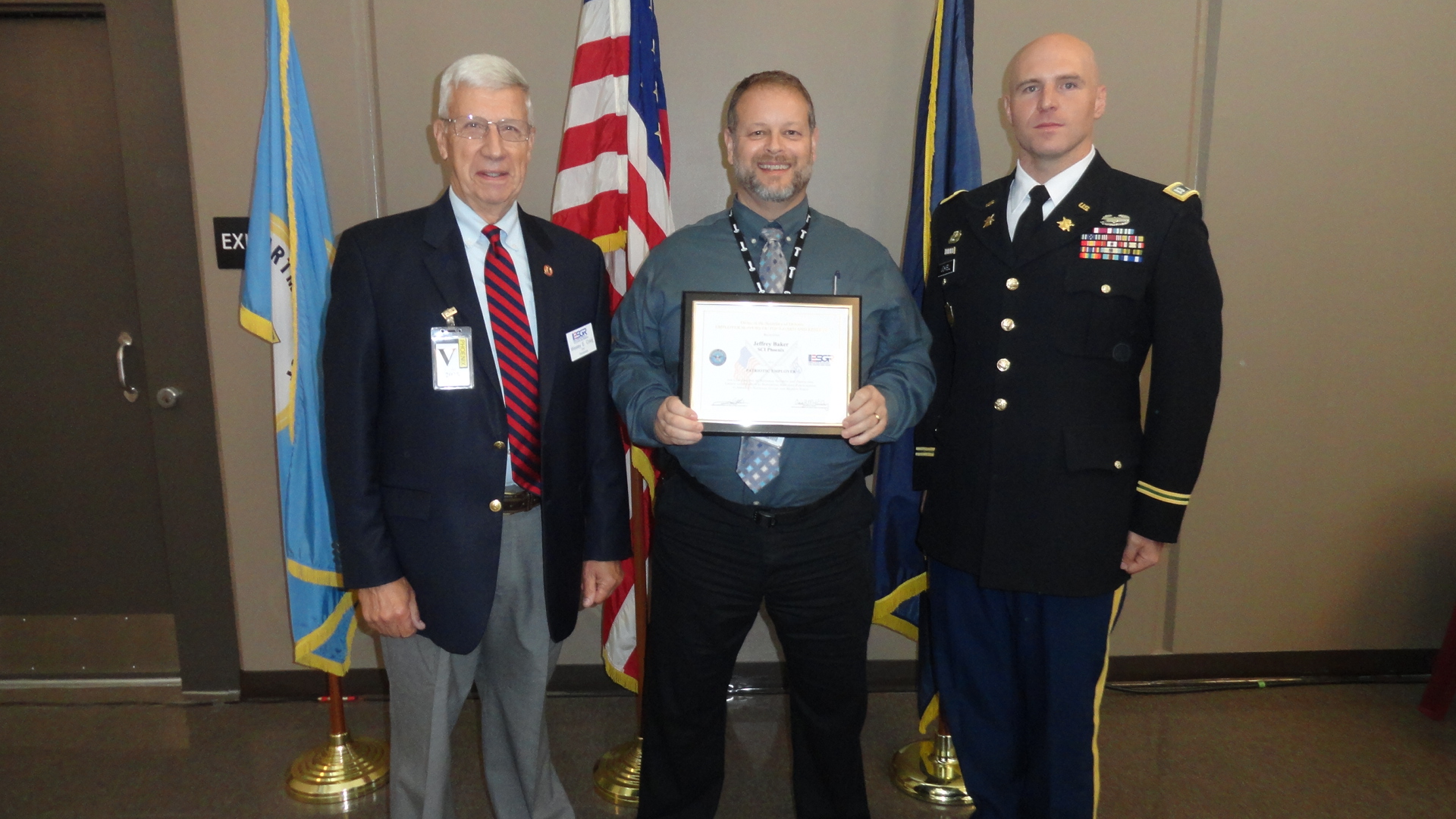 Unit Manager Jeffrey Baker receives an award