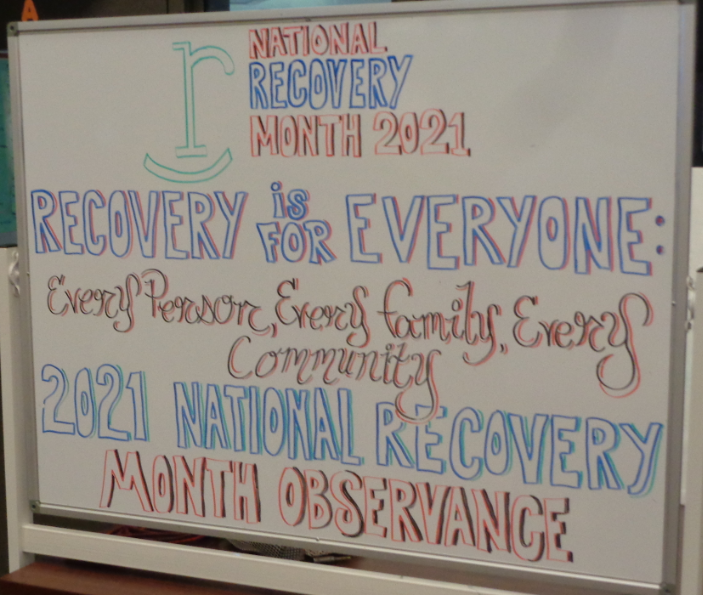 A board promoting recovery month