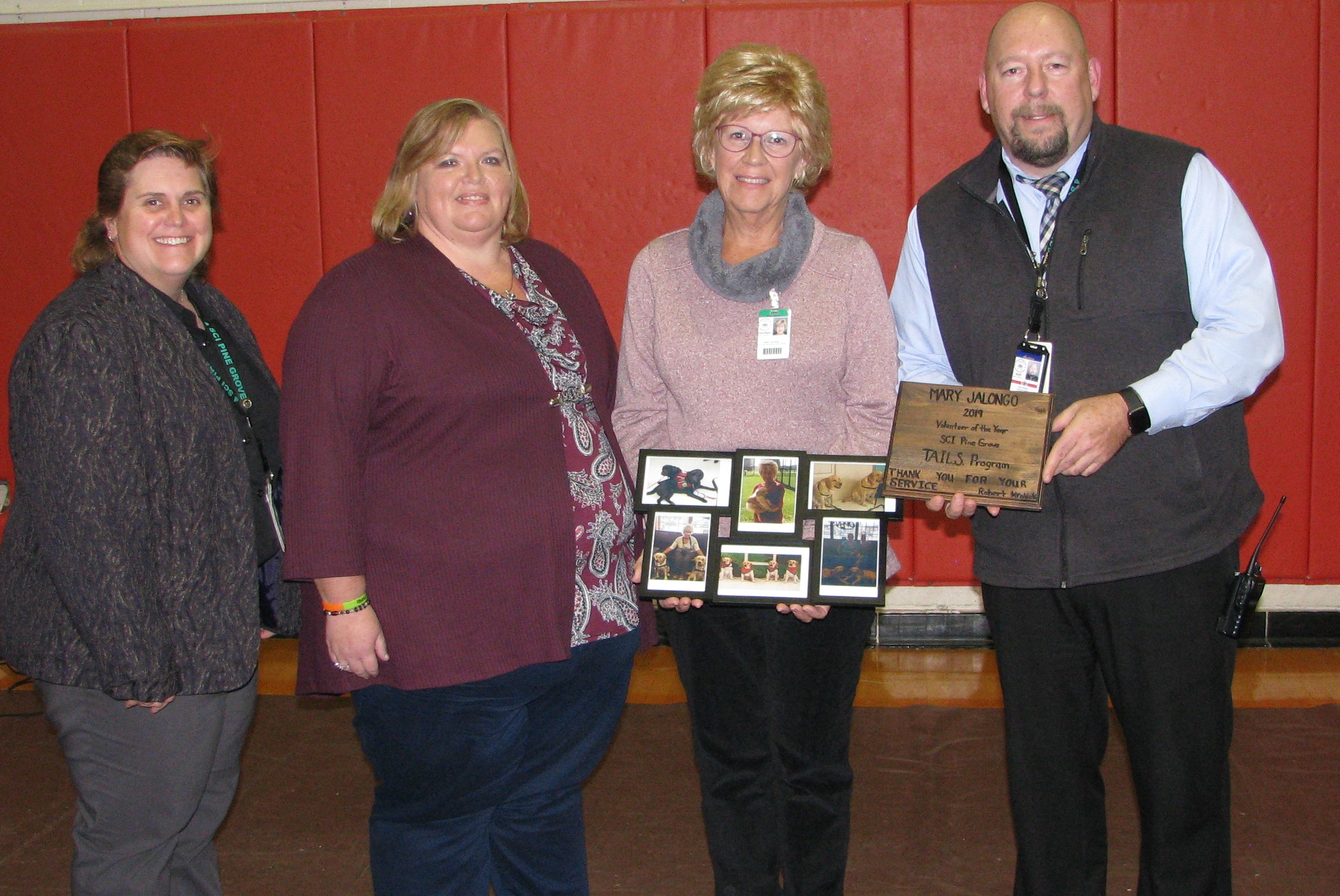 SCI Pine Grove staff award their volunteer of the year
