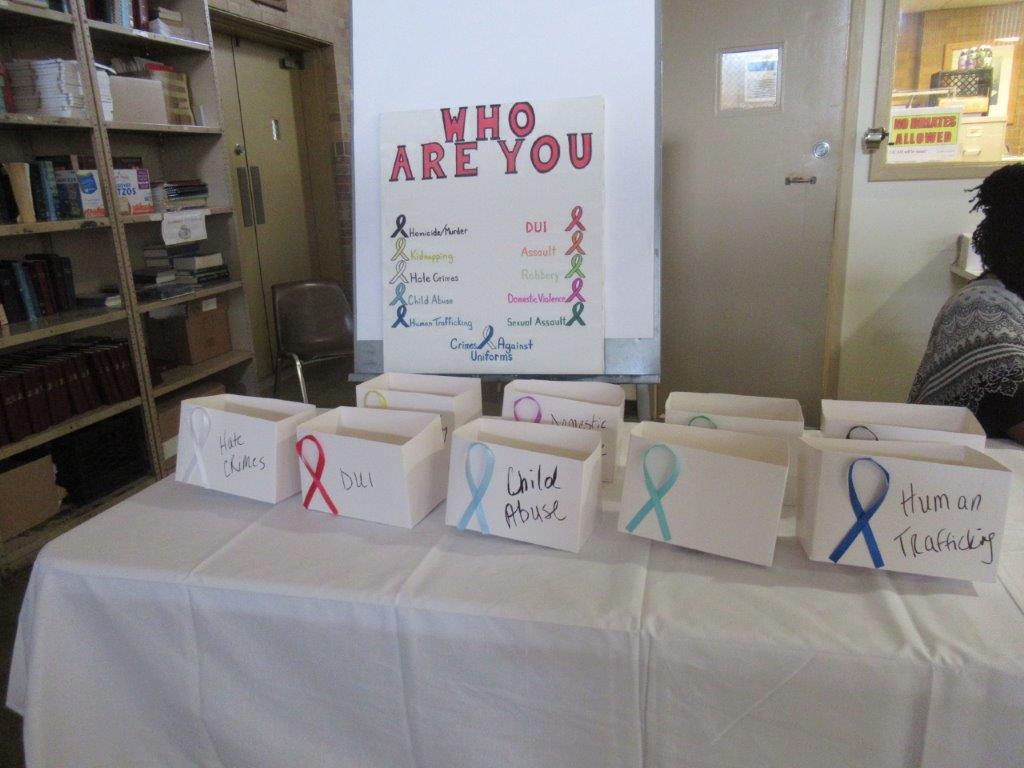A table with boxes with ribbons on them