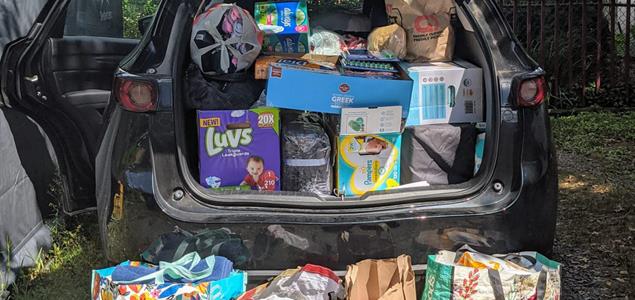 An SUV full of donated supplies