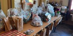 A table full of raffle baskets