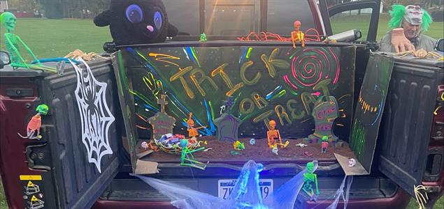 A truck bed decorated with Halloween decorations for a Trunk or Treat.