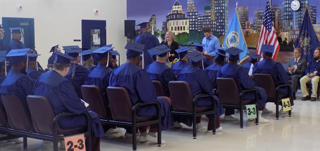 Incarcerated graduates attend their graduation ceremony at SCI Benner Township