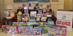 A table full of donated toys