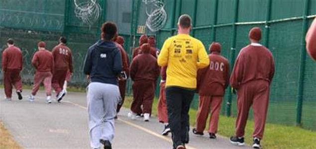 Inmates and staff run on SCI Chester's track