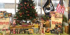 Donated gifts under a Christmas tree