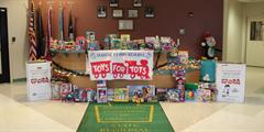 Toys and donation boxes in the lobby of SCI Mercer.