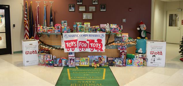 Toys and donation boxes in the lobby of SCI Mercer.