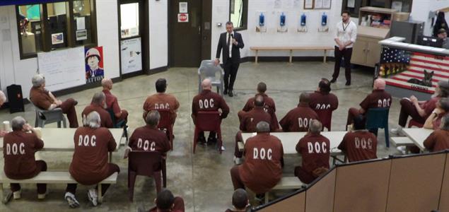A guest speaker talks to inmates on the SCI Mercer VSU