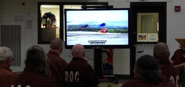 Inmates on the SCI Mercer VSU watch a patriotic movie