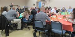 People eating at a luncheon