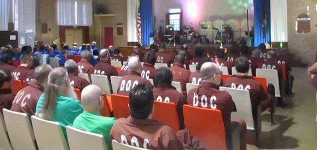 Incarcerated individuals at SCI Waymart watch a holiday concert with performances by their fellow inmates.
