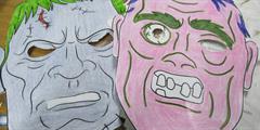 Two paper monster masks.