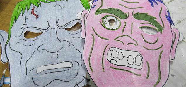 Two paper monster masks.