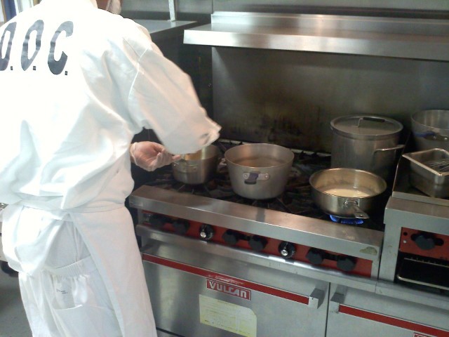 Culinary Academy - inmate at stove.jpg