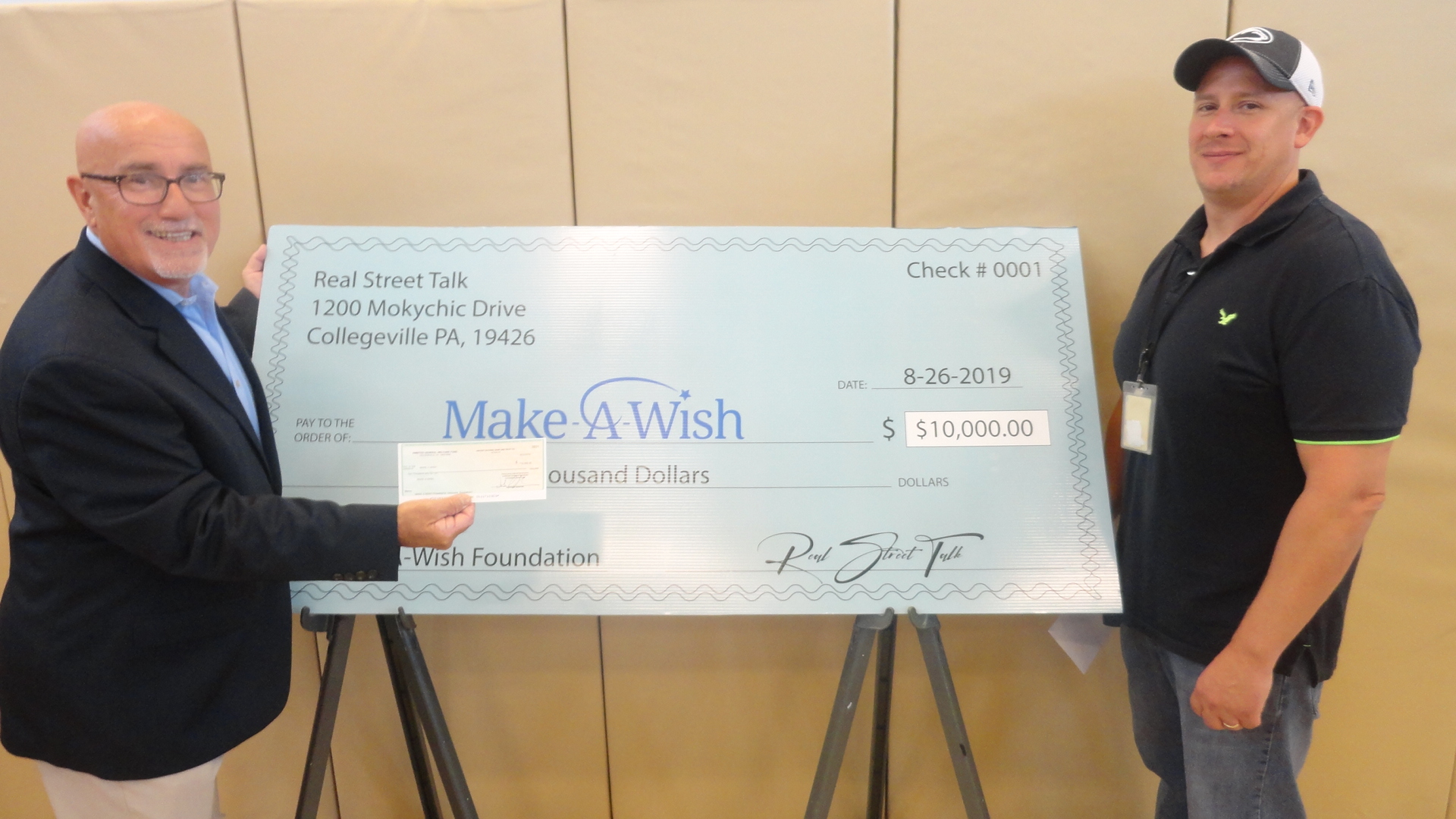 SCI Phoenix staff presents Make a Wish with a donation