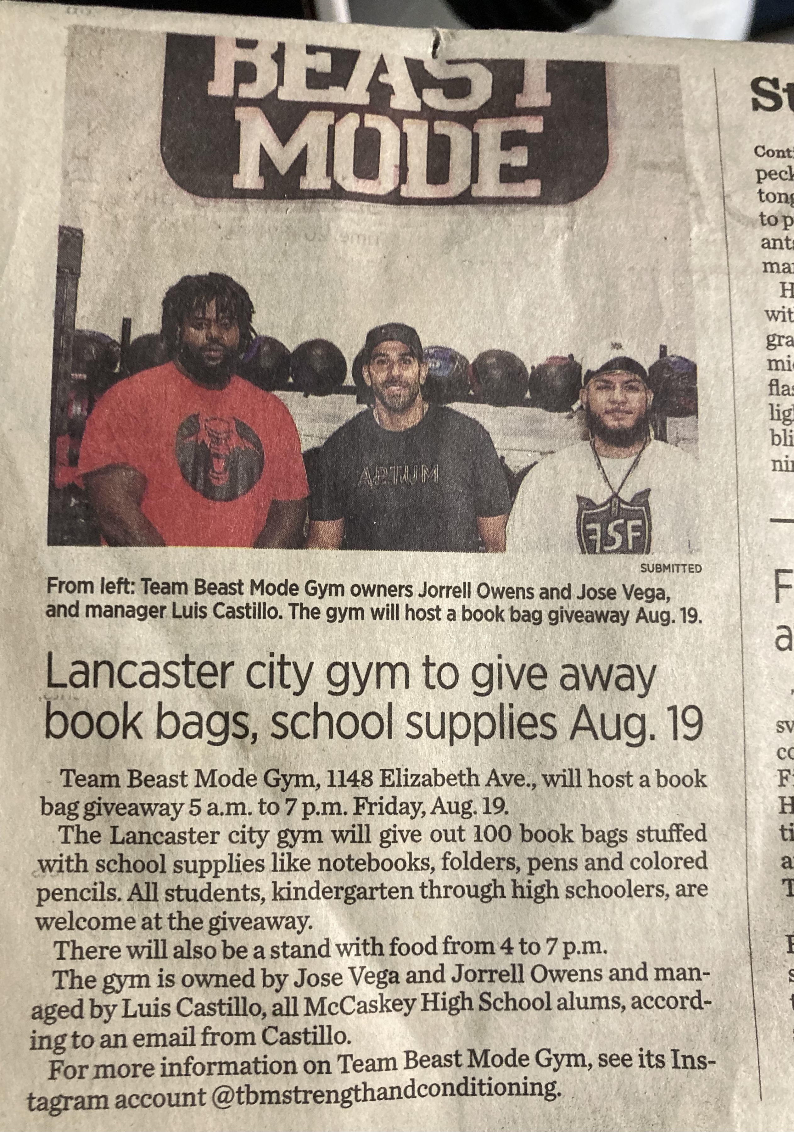 A newspaper article about Team Beast Mode donating backpacks and school supplies to local students.