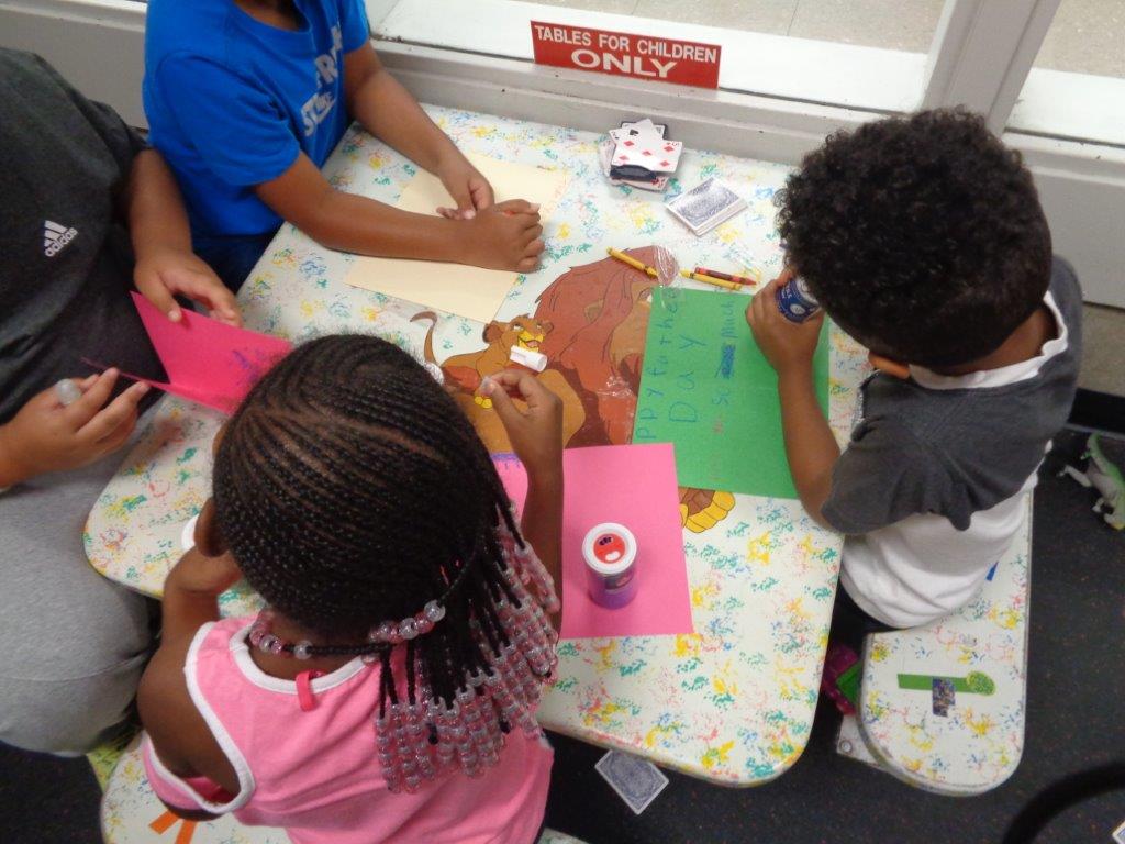 Children make Father's Day cards at SCI Smithfield