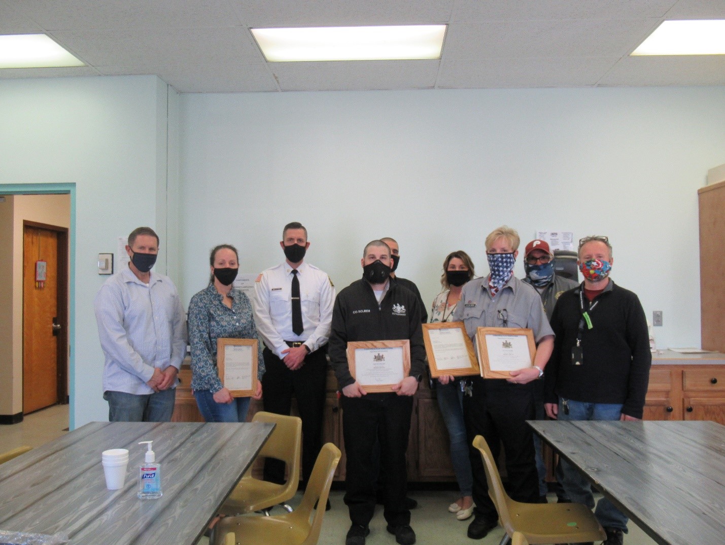 SCI Waymart leadership stand with employees who received awards